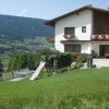Blick auf das Gaesteheim im Sommer